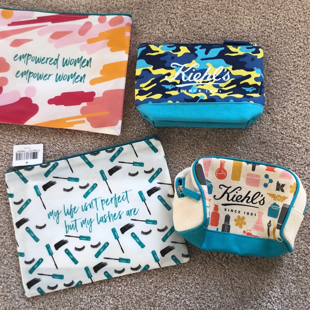 Assorted cosmetic bags and travel samples